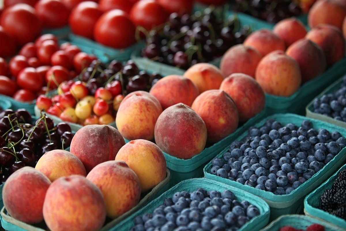 colorful blueberries, peaches, cherries, and other stone fruits that are in season in Napa supermarkets during the summer months